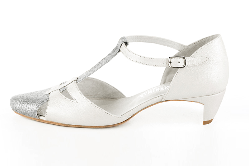 French elegance and refinement for these light silver and pure white dress T-strap open side shoes, 
                available in many subtle leather and colour combinations. Its comfortable fit will accompany you until the end of the night.
Its charming, playful cutout gives you plenty of customization options.  
                Matching clutches for parties, ceremonies and weddings.   
                You can customize these shoes to perfectly match your tastes or needs, and have a unique model.  
                Choice of leathers, colours, knots and heels. 
                Wide range of materials and shades carefully chosen.  
                Rich collection of flat, low, mid and high heels.  
                Small and large shoe sizes - Florence KOOIJMAN